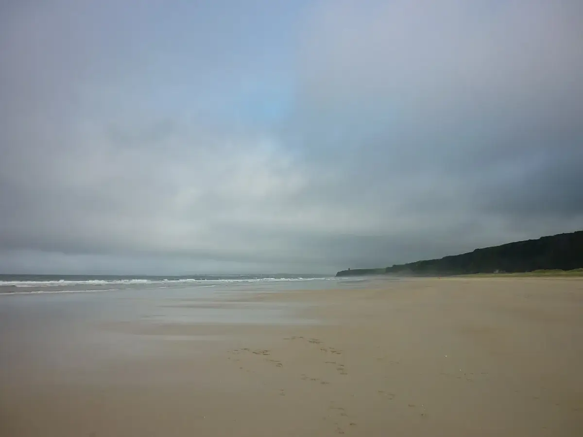 Coastal scene near Benone Strand, used as a representative image for Railway Sleeper Hostel