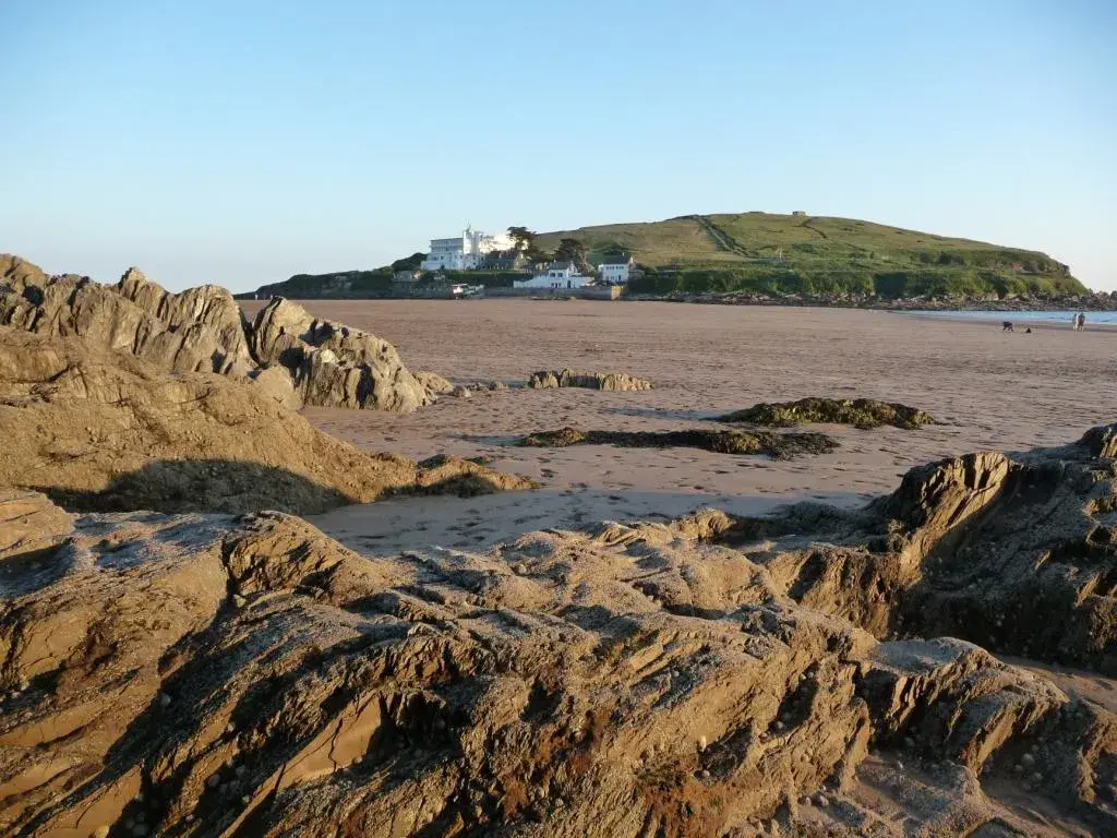 Coastal scene near Bigbury-on-Sea, used as a representative image for The Henley Hotel