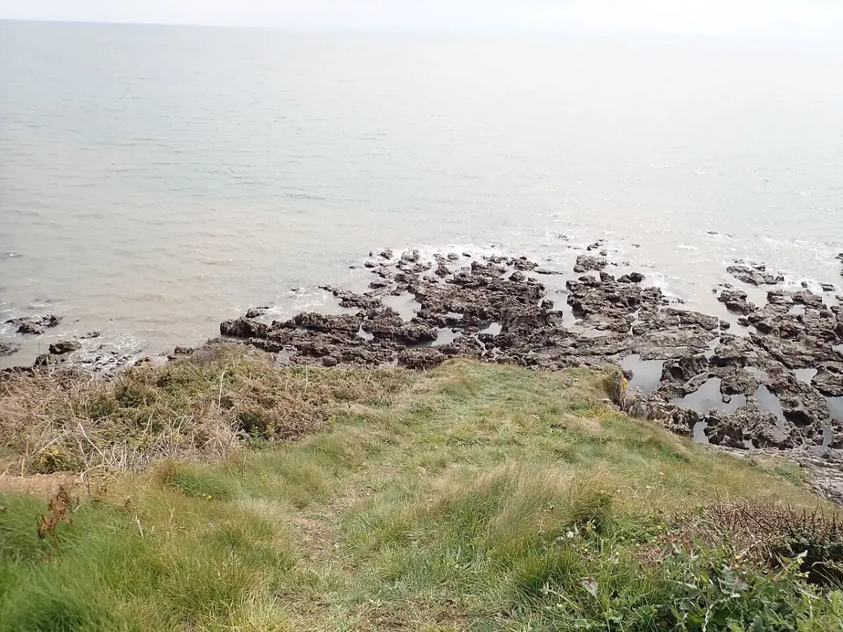 Coastal scene near Langland Bay, used as a representative location image for The Oyster House