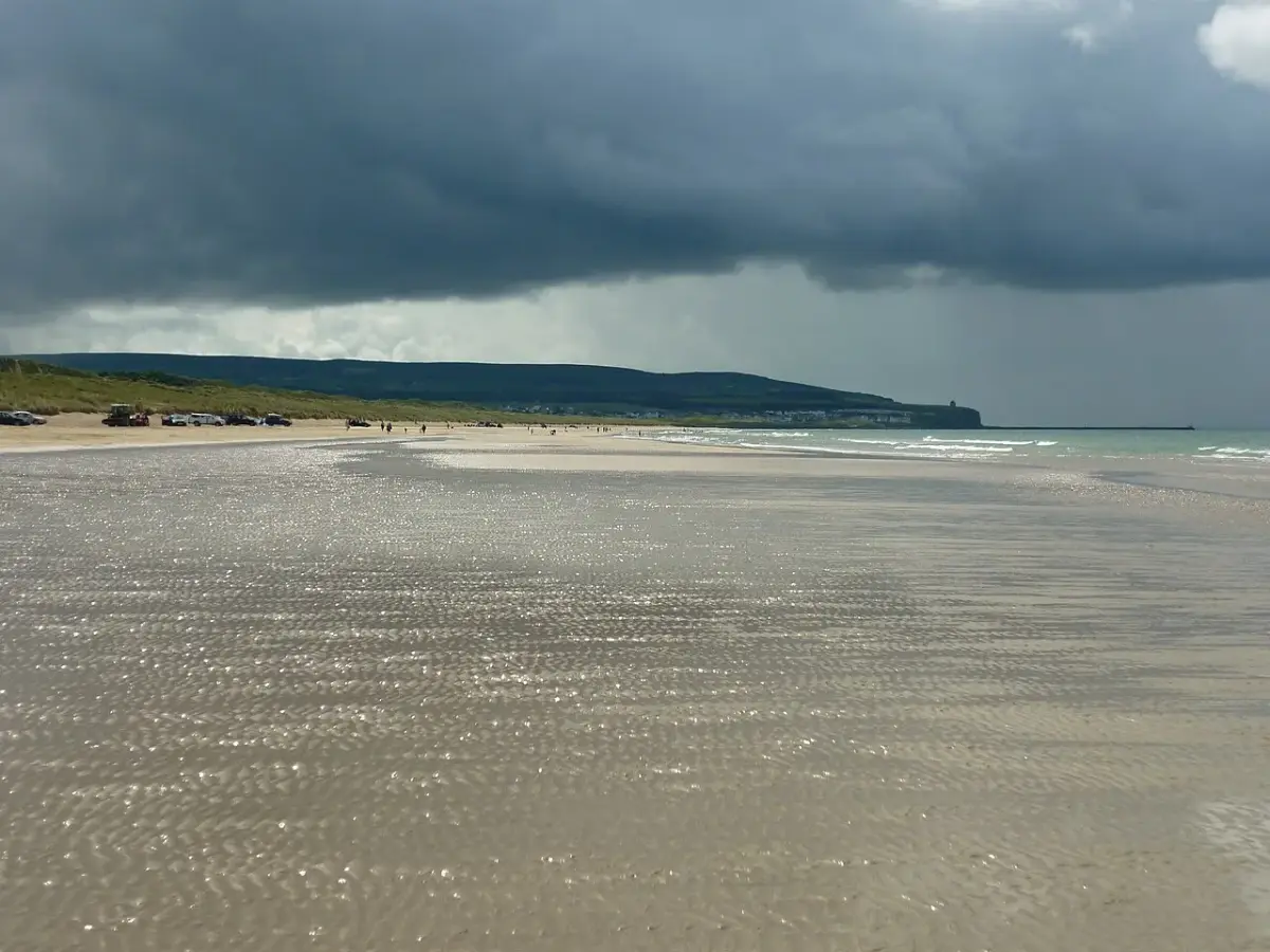 Coastal scene near Portstewart Strand, used as a representative image for Rick's Causeway Coast Hostel