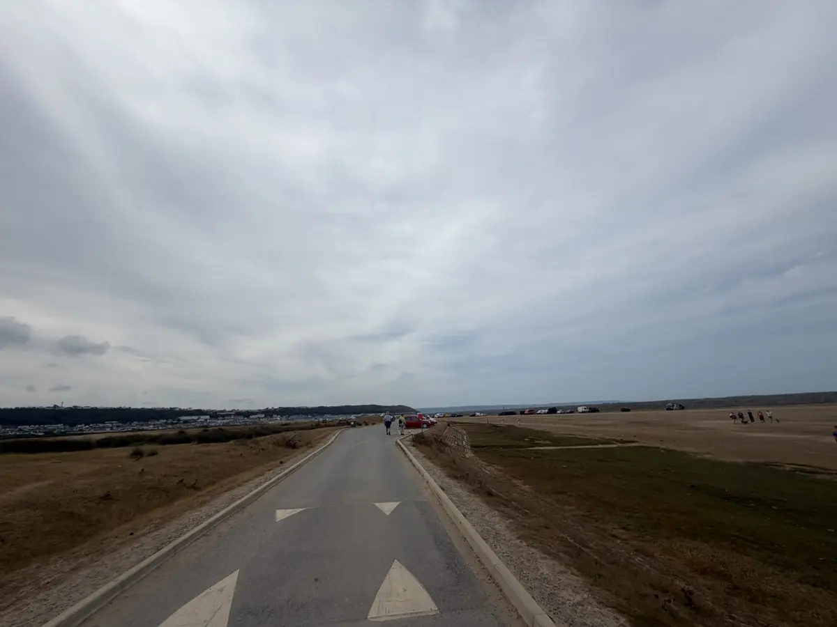 The road across Northam Burrows, with the estuary on the left