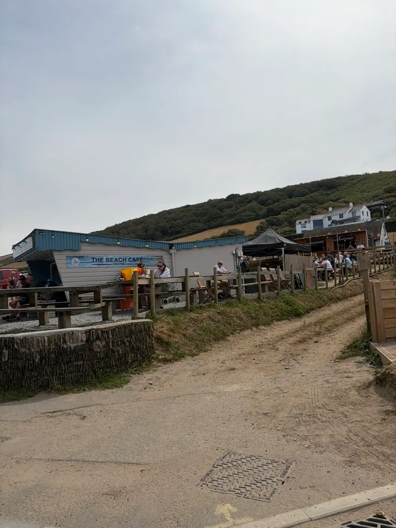 The Beach Cafe and its outdoor seating beside the beach at Croyde