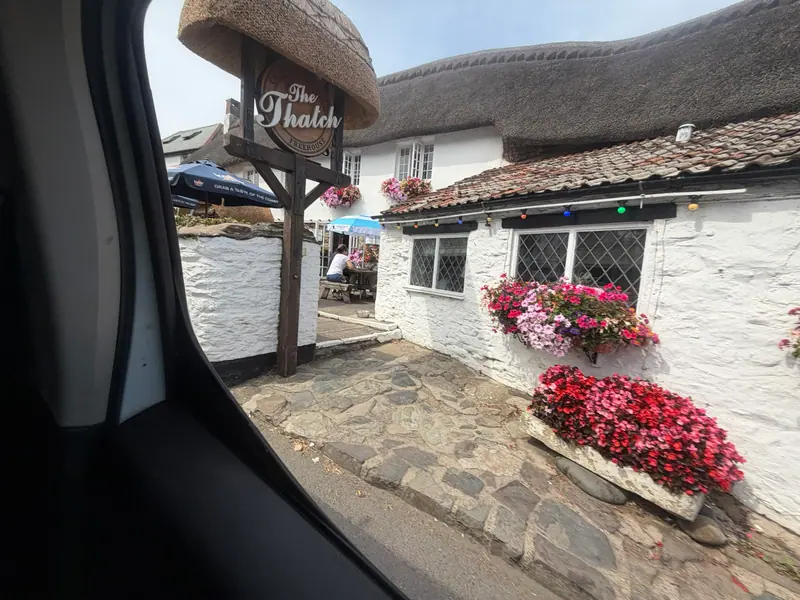 The Thatch pub in Croyde village with flower boxes outside