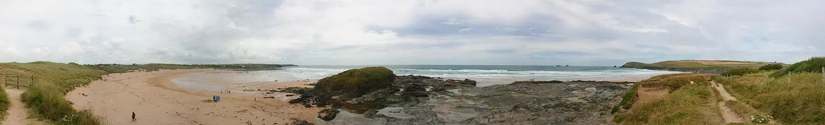 Panoramic view of Constantine Bay's dunes, sand and rocky foreshore