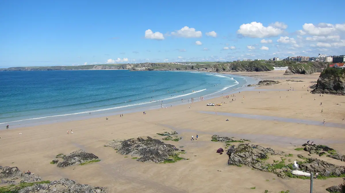 Towan Beach in Newquay with turquoise water and the town above